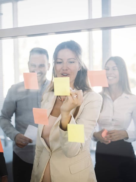 Employee writing notes