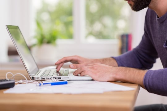 man working on computer